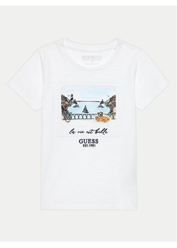 Guess T-Shirt N4GI16 K6XN4 Biały Regular Fit ze sklepu MODIVO w kategorii Bluzki dziewczęce - zdjęcie 181191003