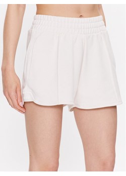Guess Szorty sportowe Dalya V3GD07 KAIJ1 Beżowy Loose Fit ze sklepu MODIVO w kategorii Szorty - zdjęcie 181193540