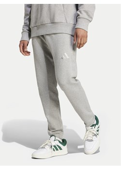 adidas Spodnie dresowe ALL SZN French Terry IY6558 Szary Loose Fit ze sklepu MODIVO w kategorii Spodnie męskie - zdjęcie 181193593