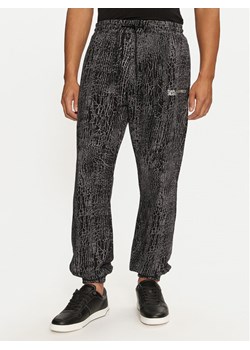 Karl Lagerfeld Jeans Spodnie dresowe 246D1005 Czarny Regular Fit ze sklepu MODIVO w kategorii Spodnie męskie - zdjęcie 181194730