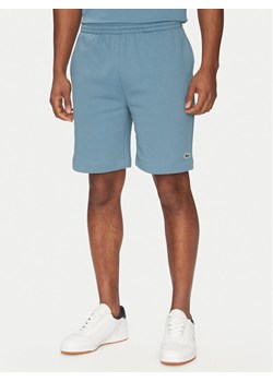 Lacoste Szorty sportowe GH9627 Niebieski Regular Fit ze sklepu MODIVO w kategorii Spodenki męskie - zdjęcie 181195634