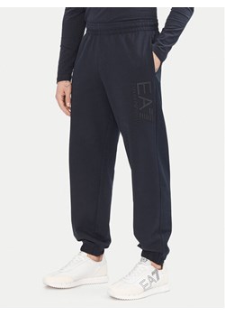 EA7 Emporio Armani Spodnie dresowe 7M000233 AF13512 UB102 Granatowy Regular Fit ze sklepu MODIVO w kategorii Spodnie męskie - zdjęcie 181195724