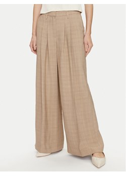 Herskind Spodnie materiałowe Lotus 5114110 Beżowy Relaxed Fit ze sklepu MODIVO w kategorii Spodnie damskie - zdjęcie 181195752