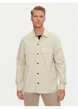 Calvin Klein Jeans Koszula Cargo J30J326970 Beżowy Regular Fit ze sklepu MODIVO w kategorii Koszule męskie - zdjęcie 181196060