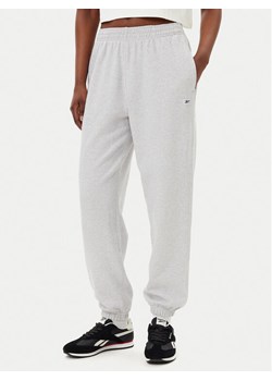 Reebok Spodnie dresowe 100221467 Szary Regular Fit ze sklepu MODIVO w kategorii Spodnie damskie - zdjęcie 181196604