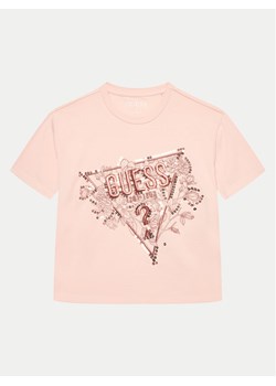 Guess T-Shirt J4YI30 K6YW4 Różowy Boxy Fit ze sklepu MODIVO w kategorii Bluzki dziewczęce - zdjęcie 181201204