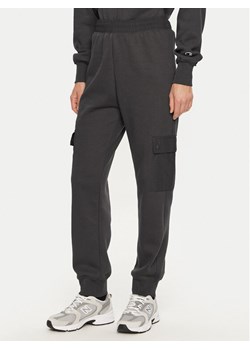 Champion Spodnie dresowe 117499 Szary Regular Fit ze sklepu MODIVO w kategorii Spodnie damskie - zdjęcie 181202454