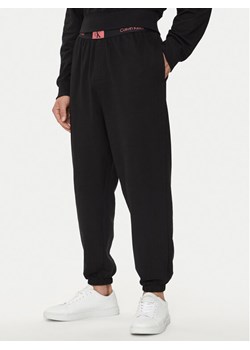 Calvin Klein Underwear Spodnie piżamowe 000NM2393E Czarny Regular Fit ze sklepu MODIVO w kategorii Piżamy męskie - zdjęcie 181202752