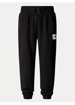 The North Face Spodnie dresowe Fine NF0A8C1K Czarny Tapered Fit ze sklepu MODIVO w kategorii Spodnie męskie - zdjęcie 181202971