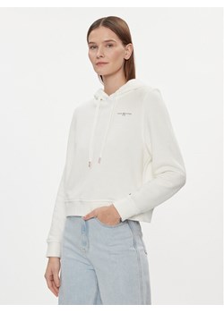 Tommy Hilfiger Bluza 1985 WW0WW40274 Écru Relaxed Fit ze sklepu MODIVO w kategorii Bluzy damskie - zdjęcie 181203330
