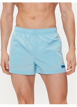 Calvin Klein Swimwear Szorty kąpielowe KM0KM00941 Błękitny Regular Fit ze sklepu MODIVO w kategorii Kąpielówki - zdjęcie 181204711