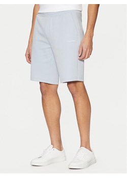 Calvin Klein Szorty sportowe Micro Logo K10K111208 Niebieski Regular Fit ze sklepu MODIVO w kategorii Spodenki męskie - zdjęcie 181205754
