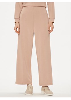 United Colors Of Benetton Spodnie dzianinowe 3UNN3F03B Beżowy Relaxed Fit ze sklepu MODIVO w kategorii Spodnie damskie - zdjęcie 181205984