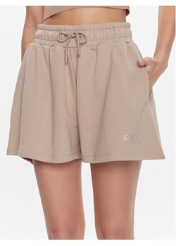 Guess Szorty sportowe Eleanora V4RD04 KC5O0 Beżowy Relaxed Fit ze sklepu MODIVO w kategorii Szorty - zdjęcie 181206773