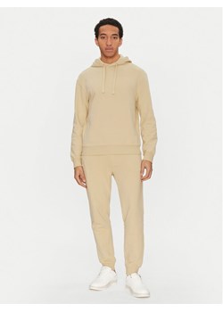 HUGO Dres Dapodayote 50492581 Beżowy Relaxed Fit ze sklepu MODIVO w kategorii Dresy męskie - zdjęcie 181207091