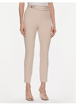 Marciano Guess Spodnie materiałowe Karen 4RGB02 6869Z Beżowy Slim Fit ze sklepu MODIVO w kategorii Spodnie damskie - zdjęcie 181207761