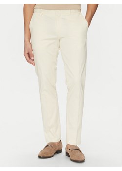 BOSS Spodnie garniturowe C-Genius 50539970 Écru Slim Fit ze sklepu MODIVO w kategorii Spodnie męskie - zdjęcie 181208130