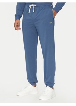 BOSS Spodnie dresowe Mix&Match 50515305 Niebieski Regular Fit ze sklepu MODIVO w kategorii Spodnie męskie - zdjęcie 181213114