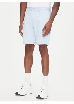 Tommy Jeans Szorty materiałowe Scanton DM0DM21950 Błękitny Slim Fit ze sklepu MODIVO w kategorii Spodenki męskie - zdjęcie 181219352