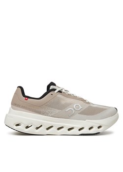 Buty do biegania On Cloudsurfer  3WE30053213 Beżowy ze sklepu eobuwie.pl w kategorii Buty sportowe damskie - zdjęcie 181327912