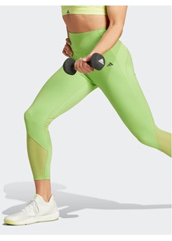 adidas Legginsy Tailored HIIT Training 7/8 Leggings IK4247 Zielony ze sklepu MODIVO w kategorii Spodnie damskie - zdjęcie 181886610