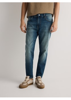 Reserved - Jeansy carrot slim z efektem sprania - indigo jeans ze sklepu Reserved w kategorii Jeansy męskie - zdjęcie 181919122