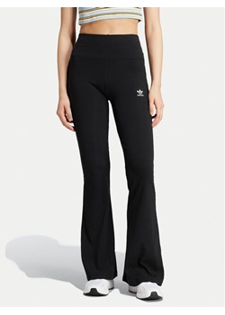 adidas Legginsy Essentials IW5727 Czarny Slim Fit ze sklepu MODIVO w kategorii Spodnie damskie - zdjęcie 181969412