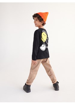 Reserved - Longsleeve oversize SmileyWorld® - czarny ze sklepu Reserved w kategorii T-shirty chłopięce - zdjęcie 182001524