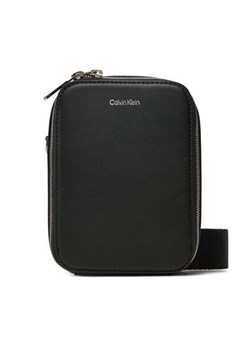 Saszetka Calvin Klein Ck Sleek Reporter Xs K50K512747 Czarny ze sklepu eobuwie.pl w kategorii Saszetki - zdjęcie 182089941