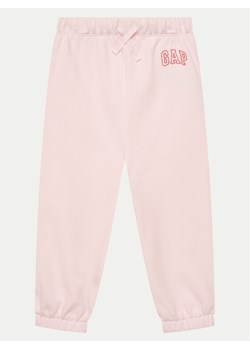 Gap Spodnie dresowe 743507-02 Różowy Relaxed Fit ze sklepu MODIVO w kategorii Spodnie dziewczęce - zdjęcie 182594772