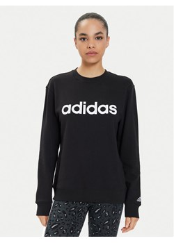 adidas Bluza Essentials Linear IC6878 Czarny Regular Fit ze sklepu MODIVO w kategorii Bluzy damskie - zdjęcie 182595213