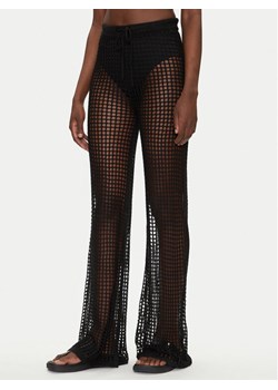 Guess Spodnie palazzo E5GB02 Z3N30 Czarny Palazzo Fit ze sklepu MODIVO w kategorii Spodnie damskie - zdjęcie 182595294