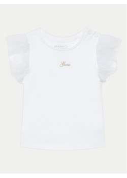 Guess Bluzka K5GI18 K6YW4 Biały Regular Fit ze sklepu MODIVO w kategorii Bluzki dziewczęce - zdjęcie 182595554