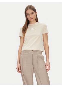 Calvin Klein Jeans T-Shirt Monologo Baby Tee J20J223113 Beżowy Slim Fit ze sklepu MODIVO w kategorii Bluzki damskie - zdjęcie 182596843