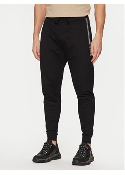 BOSS Spodnie dresowe Authentic 50535813 Czarny Regular Fit ze sklepu MODIVO w kategorii Spodnie męskie - zdjęcie 182597500