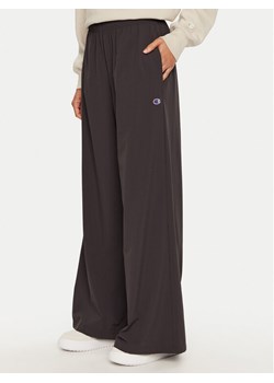 Champion Spodnie dresowe 117472 Czarny Wide Leg ze sklepu MODIVO w kategorii Spodnie damskie - zdjęcie 182597953