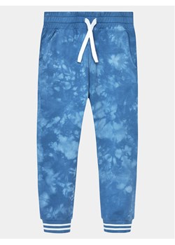 United Colors Of Benetton Spodnie dresowe 3EM5CF04V Niebieski Regular Fit ze sklepu MODIVO w kategorii Spodnie chłopięce - zdjęcie 182598700