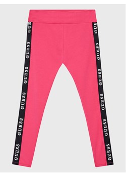 Guess Legginsy J2YB09 KABR0 Różowy Slim Fit ze sklepu MODIVO w kategorii Spodnie dziewczęce - zdjęcie 182599933