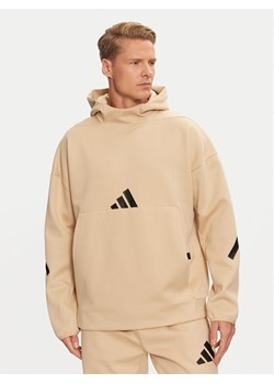 adidas Bluza Z.N.E. JJ4894 Beżowy Loose Fit ze sklepu MODIVO w kategorii Bluzy męskie - zdjęcie 182601444