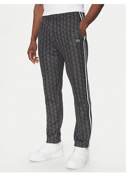 Lacoste Spodnie dresowe XH1440 Szary Regular Fit ze sklepu MODIVO w kategorii Spodnie męskie - zdjęcie 182601811