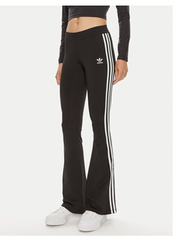 adidas Legginsy IN1100 Czarny Flared Fit ze sklepu MODIVO w kategorii Spodnie damskie - zdjęcie 182602953