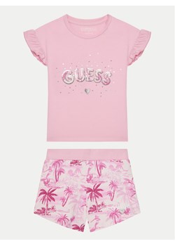 Guess Komplet t-shirt i spodenki K5GG05 K6YW4 Różowy Regular Fit ze sklepu MODIVO w kategorii Piżamy dziecięce - zdjęcie 182603120