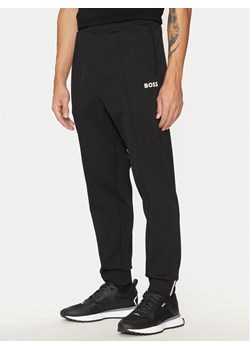 Boss Spodnie dresowe Hadiko 50530724 Czarny Regular Fit ze sklepu MODIVO w kategorii Spodnie męskie - zdjęcie 182603322