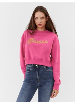 Guess Bluza W3BQ13 KB681 Różowy Regular Fit ze sklepu MODIVO w kategorii Bluzy damskie - zdjęcie 182603441