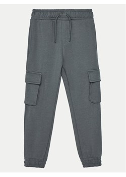 NAME IT Spodnie dresowe 13224991 Szary Relaxed Fit ze sklepu MODIVO w kategorii Spodnie chłopięce - zdjęcie 182604563