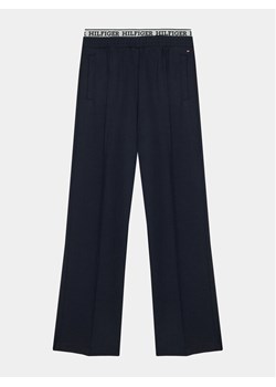 Tommy Hilfiger Spodnie materiałowe Monotype KG0KG07747 D Granatowy Regular Fit ze sklepu MODIVO w kategorii Spodnie chłopięce - zdjęcie 182606111