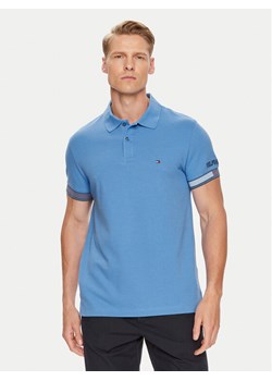 Tommy Hilfiger Polo Flag MW0MW34780 Niebieski Slim Fit ze sklepu MODIVO w kategorii T-shirty męskie - zdjęcie 182607572