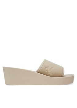 Calvin Klein Jeans Klapki Beach Wedge Slide Canvas YW0YW01725 Beżowy ze sklepu MODIVO w kategorii Klapki damskie - zdjęcie 182608080
