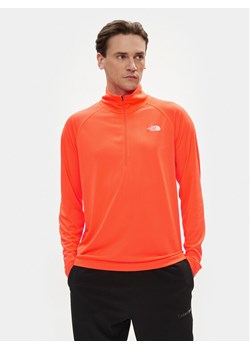 The North Face Koszulka techniczna Flex NF0A7ZBC Pomarańczowy Slim Fit ze sklepu MODIVO w kategorii T-shirty męskie - zdjęcie 182608204