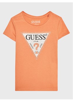 Guess T-Shirt J2YI51 K6YW1 Pomarańczowy Regular Fit ze sklepu MODIVO w kategorii Bluzki dziewczęce - zdjęcie 182608834